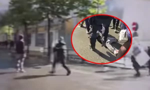E përplasën për toke me forcë – Pamje kur policia e rrah protestuesin derisa ai është i shtrirë